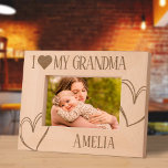 I Love my Grandma Birthday picture frame Engraved Frames<br><div class="desc">Celebrate the special bond between Grandma and her loved ones with this beautifully engraved "I Love My Grandma" picture frame. Perfect for showcasing cherished memories, this rustic wooden frame makes an ideal birthday gift. Personalize it with Grandma’s name or a heartfelt message to create a one-of-a-kind keepsake she’ll treasure forever....</div>
