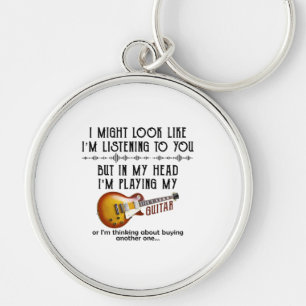 I Might Look Like Listening To You, But In My Head Keychain