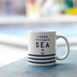 I Need Vitamin Sea Navy Anchor Quote Coffee Mug<br><div class="desc">Suffering from a vitamin "sea" deficiency? Sip your morning coffee or tea from our cute,  summery nautical mug featuring "I Need Vitamin Sea" in navy blue lettering with an anchor illustration and nautical stripe border.</div>