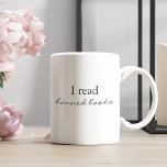 I read banned books Two-Tone coffee mug<br><div class="desc">Experience the thrill of forbidden literature every morning with the "I Read Banned Books" coffee mug. This isn't just a mug—it's a statement, a testament to your intellectual curiosity and rebellious spirit. Chiseled with a bold, daring statement that underlines your taste for the unconventional and the controversial, this mug is...</div>