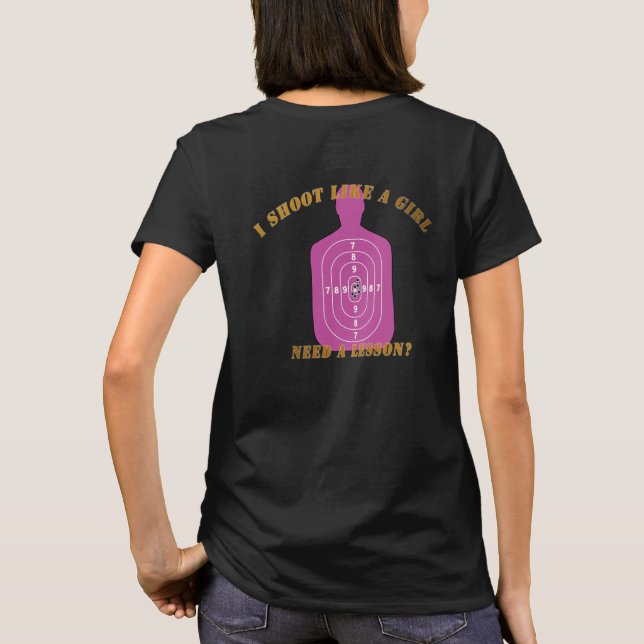 I shoot like a girl. Need a lesson? T-Shirt (Back)