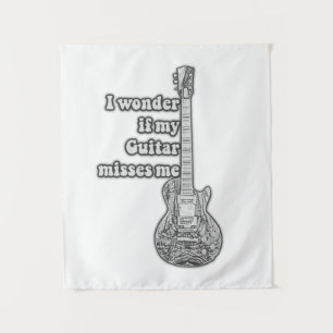 I wonder if my guitar misses me. Black and white Tapestry
