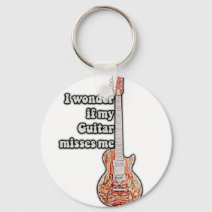 I wonder if my guitar misses me. funny quote keychain