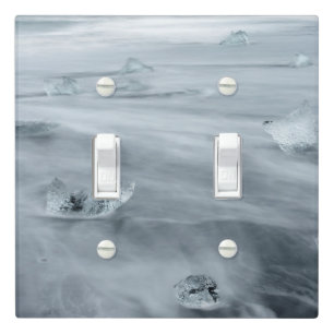 Ice and water on a beach, iceland light switch cover