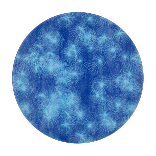 Ice crystal starbursts, blue background cutting board