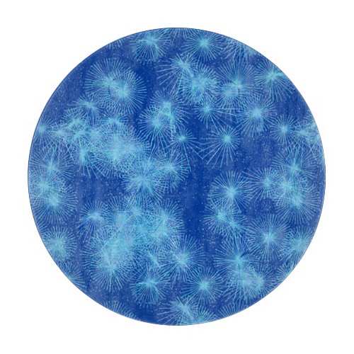 Ice crystal starbursts blue background cutting board