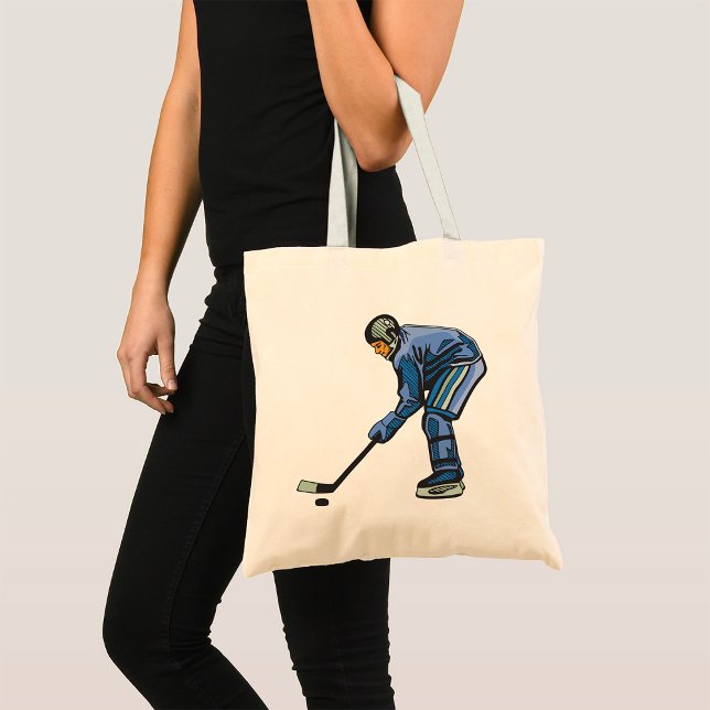 Ice Hockey Player in Blue Uniform Tote Bag (Creator Uploaded)