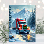 Ice Road Truck Driver Christmas Card<br><div class="desc">Wish your favorite truck driver a Merry Christmas with this festive red semi-truck traveling through the snowy mountains with a Christmas wreath on the front. Personalize with your own text.</div>
