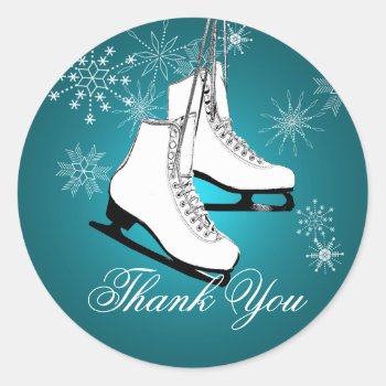 Ice Skates And Snowflakes Teal Classic Round Sticker by happygotimes at Zazzle