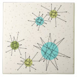 Iconic Atomic Starbursts Large Ceramic Tile<br><div class="desc">This Iconic Atomic Starbursts Large Ceramic Tile pattern features iconic atomic starbursts. That’s right! The old school, cream colored background with gold speckles is the perfect backdrop for the vibrant turquoise, soothing celery, and kitschy pear green colored circles. The spots of color are sporadically placed in various sizes with overlaying...</div>