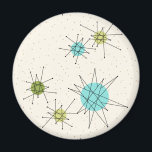 Iconic Atomic Starbursts Round Magnet<br><div class="desc">This Iconic Atomic Starbursts Round Magnet pattern features iconic atomic starbursts. That’s right! The old school, cream colored background with gold speckles is the perfect backdrop for the vibrant turquoise, soothing celery, and kitschy pear green colored circles. The spots of color are sporadically placed in various sizes with overlaying black...</div>