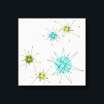 Iconic Atomic Starbursts Wrapped Canvas Print<br><div class="desc">This Iconic Atomic Starbursts Wrapped Canvas pattern features iconic atomic starbursts. That’s right! The old school, cream colored background with gold speckles is the perfect backdrop for the vibrant turquoise, soothing celery, and kitschy pear green colored circles. The spots of color are sporadically placed in various sizes with overlaying black...</div>