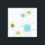 Iconic Atomic Starbursts Wrapped Canvas Print<br><div class="desc">This Iconic Atomic Starbursts Wrapped Canvas pattern features iconic atomic starbursts. That’s right! The old school, cream colored background with gold speckles is the perfect backdrop for the vibrant turquoise, soothing celery, and kitschy pear green colored circles. The spots of color are sporadically placed in various sizes with overlaying black...</div>