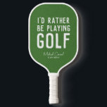 I'd rather be playing golf funny personalized pickleball paddle<br><div class="desc">For the reluctant player who'd rather be on the golf course, this funny personalized pickleball paddle features the phrase "I'd rather be playing golf" along with customizable elements like name, team name and initial or other text on a green turf background. Make this yours and make your teammates and opponents...</div>