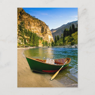 IDAHO, Fishing boat on a sandy beach in the Postcard