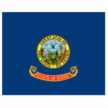 Idaho Flag: the Gem State, America Mountain West Cutout<br><div class="desc">The Idaho state flag, a simple yet powerful emblem, was officially adopted in 1907. Its design, a field of blue emblazoned with the state seal, reflects the state's natural beauty and rich history. The blue field symbolizes the vast skies and abundant water resources that characterize Idaho. - At the heart...</div>