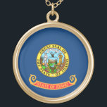 Idaho Flag: the Gem State, America Mountain West Gold Plated Necklace<br><div class="desc">The Idaho state flag, a simple yet powerful emblem, was officially adopted in 1907. Its design, a field of blue emblazoned with the state seal, reflects the state's natural beauty and rich history. The blue field symbolizes the vast skies and abundant water resources that characterize Idaho. - At the heart...</div>