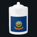 Idaho Flag: the Gem State, America Mountain West Teapot<br><div class="desc">The Idaho state flag, a simple yet powerful emblem, was officially adopted in 1907. Its design, a field of blue emblazoned with the state seal, reflects the state's natural beauty and rich history. The blue field symbolizes the vast skies and abundant water resources that characterize Idaho. - At the heart...</div>
