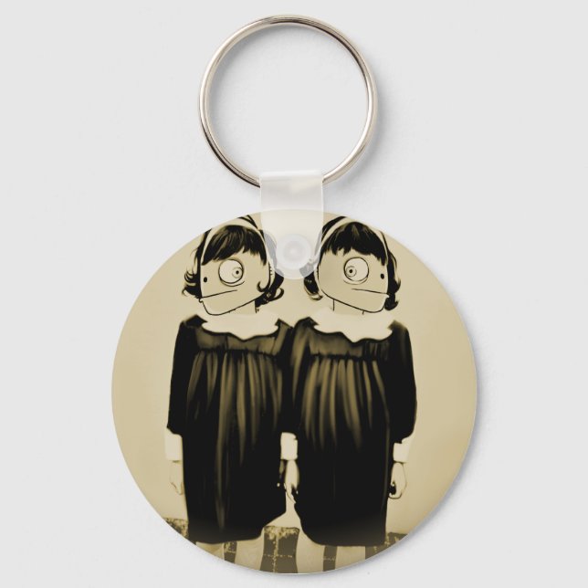 IDENTICAL CLONE KEYCHAIN (Front)