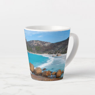 Idyllic beach in secluded bay latte mug