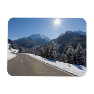 Idyllic empty road thrugh a winter landscape, 2 magnet