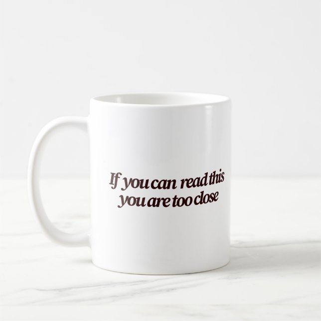If You Can Read This You're Too Close Funny Coffee Mug (Left)