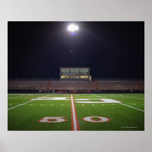 Illuminated American football field at night Poster