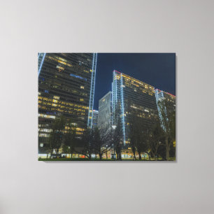 Illuminated Cityscape at Nighttime Canvas Print