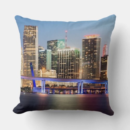 Illuminated skyline of downtown Miami at dusk Throw Pillow