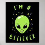 I'm A Believer Poster<br><div class="desc">"I'm A Believer" alien graphic designed by bCreative shows a smiling, green alien head surrounded by moons and stars! This makes a great gift for family, friends, or a treat for yourself! This funny graphic is a great addition to anyone's style. bCreative is a leading creator and licensor of original,...</div>