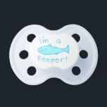I'm A Keeper (Blue) Pacifier<br><div class="desc">This adorable pacifier features a whimsical drawing of a fish with the text "I'm a keeper!" included. What a cute gift for the little one in your life.</div>