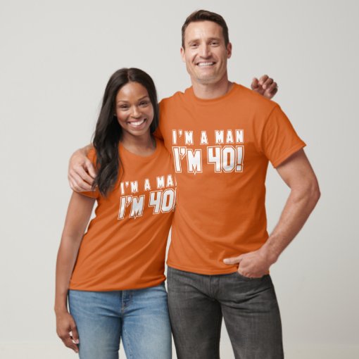 A white crew-neck t-shirt prominently featuring the text 'I'm a man I'm 40' in bold black letters.