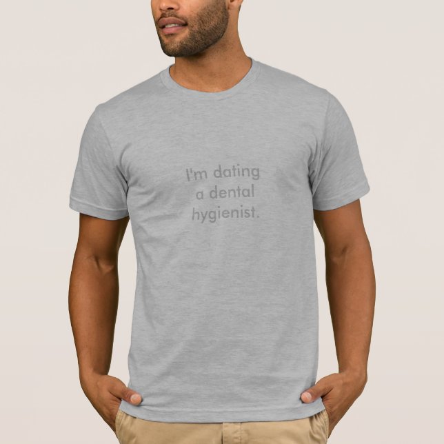 I'm dating a dental hygienist. T-Shirt (Front)