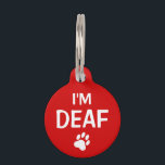 I'm Deaf Text With Custom Name And Number Pet ID Tag<br><div class="desc">White and red tag for deaf pets featuring a white paw print silhouette. On one side it reads: "I'm deaf" and on the other side there are customizable text areas for the name of the pet and for a phone number.</div>