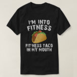 I'M INTO FITNESS Fitness Taco In My Mouth T-Shirt<br><div class="desc">This I'm into fitness taco in my mouth shirt is an I'M INTO FITNESS shirt for people who love eating tacos and want funny taco shirts! This funny taco shirt is a food pun shirt perfect if you love funny food puns! Get your I'M INTO FITNESS shirt today!</div>