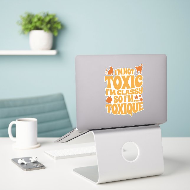I'M NOT TOXIC I'M CLASSY SO I'M TOXIQUE STICKER (Laptop On Desk)