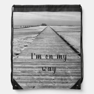 I'm on my way to the beach black and white photo drawstring bag