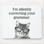 I'm silently correcting your grammar cat mousepad<br><div class="desc">I'm silently correcting your grammar cat mousepad. Funny cat photograph mouse pad design with humorous grammar police slogan. Cute gift idea for cat lover / cat person / pet owner and school teacher. (elementary / grammar / high school ) Education humor with geeky animal. Black and white kitten wearing nerdy...</div>