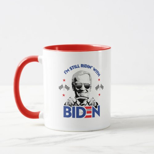 Im still ridin with Biden Mug