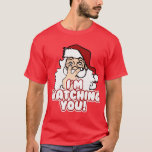 I'm Watching You Christmas Santa Claus T-Shirt<br><div class="desc">Santa Claus sees you when you're sleeping, he knows when you're awake... Seriously, that is pretty creepy. Comical Christmas season tee shirts, and apparel for celebrating the upcoming Xmas holidays! No Christmas party is complete without funny Santa holiday tee shirts and ugly sweaters, and this December 25th is no exception!...</div>