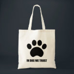 In Dog We Trust Tote Bag<br><div class="desc">dog, trust, love, Paw, print, word, cat, dog, puppy, kitten, animal, lover, symbol, cute, black, pet, owner, cute, text</div>
