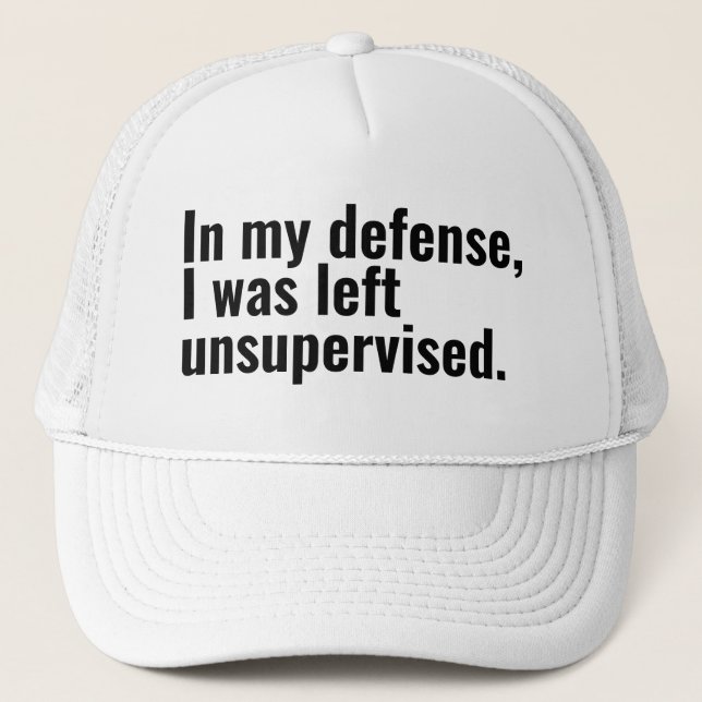 In my defense, I was left unsupervised funny text Trucker Hat (Front)
