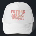 In My Engaged Era Engagement Gift Custom Fiance Trucker Hat<br><div class="desc">Introducing our "In My Engaged Era" Custom Fiance Trucker Hat – a chic and trendy accessory that's perfect for the bride-to-be. This personalized hat is not just a fashion statement but also a thoughtful engagement gift, capturing the essence of the engaged era. Featuring a cool wavy retro text and the...</div>