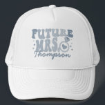 In My Engaged Era Engagement Gift Custom Fiance Trucker Hat<br><div class="desc">Elevate your engagement celebration with our "In My Engaged Era" Custom Fiance Trucker Hat. This trendy and cool accessory is the perfect personalized gift for the bride-to-be, adding a touch of retro style to her bridal shower or bachelorette party. The hat features wavy retro text, creating a unique and fashionable...</div>