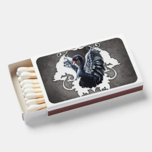 In the shadow of elegance: A black swan. Matchboxes