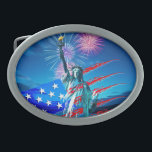 INDEPENDENCE BELT BUCKLE<br><div class="desc">The Statue of Liberty stands prominently with vibrant fireworks illuminating the night sky in the background. Stylized red and blue stripes along with star patterns evoke a patriotic theme. Independence day. Freedom. United States of America Birthday. Digital Art
Photoshop CS5</div>
