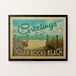 Indian Rocks Beach Vintage Travel Jigsaw Puzzle<br><div class="desc">This Greetings From Indian Rocks Beach vintage postcard design features a sandy beach with a beautiful turquoise ocean water and above the sea,  a blue sky with billowy white clouds. In vintage travels style.</div>