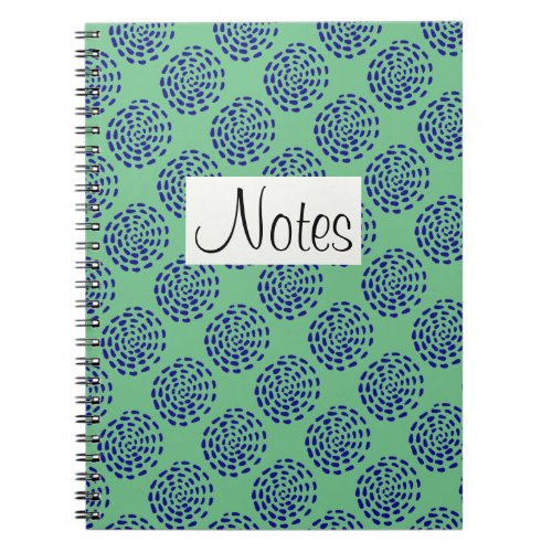 Indigo dark blue striped circle pattern on green notebook