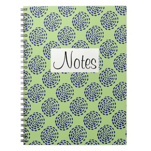 Indigo dark blue striped circle pattern on green notebook