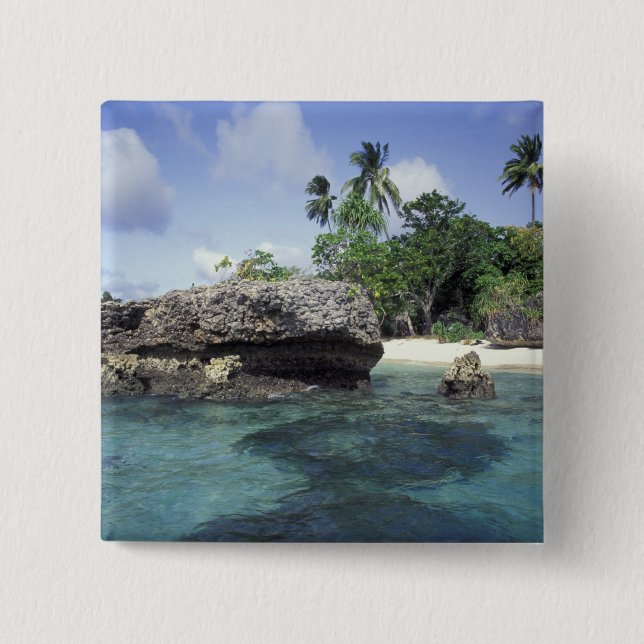 Indonesia. Rock formations along shore Button (Front)